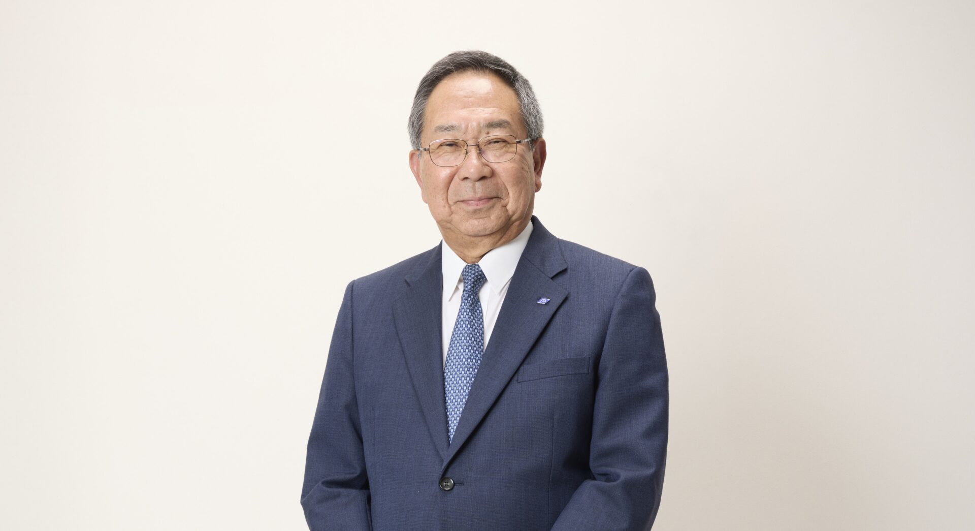 President Fumikazu Ozaki